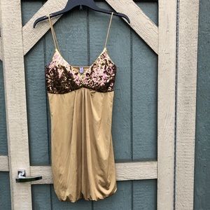 Gold sleeveless sequined dress with bubble skirt